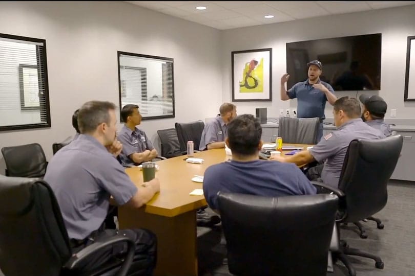 A Done leadership team meeting around a conference table