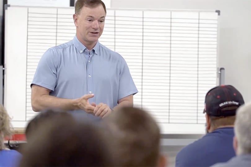 The CEO of T3, Joe Finney, talking to a group of people.